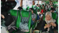 mudik gratis, program mudik, diskon transportasi, kuota mudik, pendaftaran mudik, perjalanan Lebaran, tiket kereta api, bus mudik, kuota terbatas, pulang kampung.